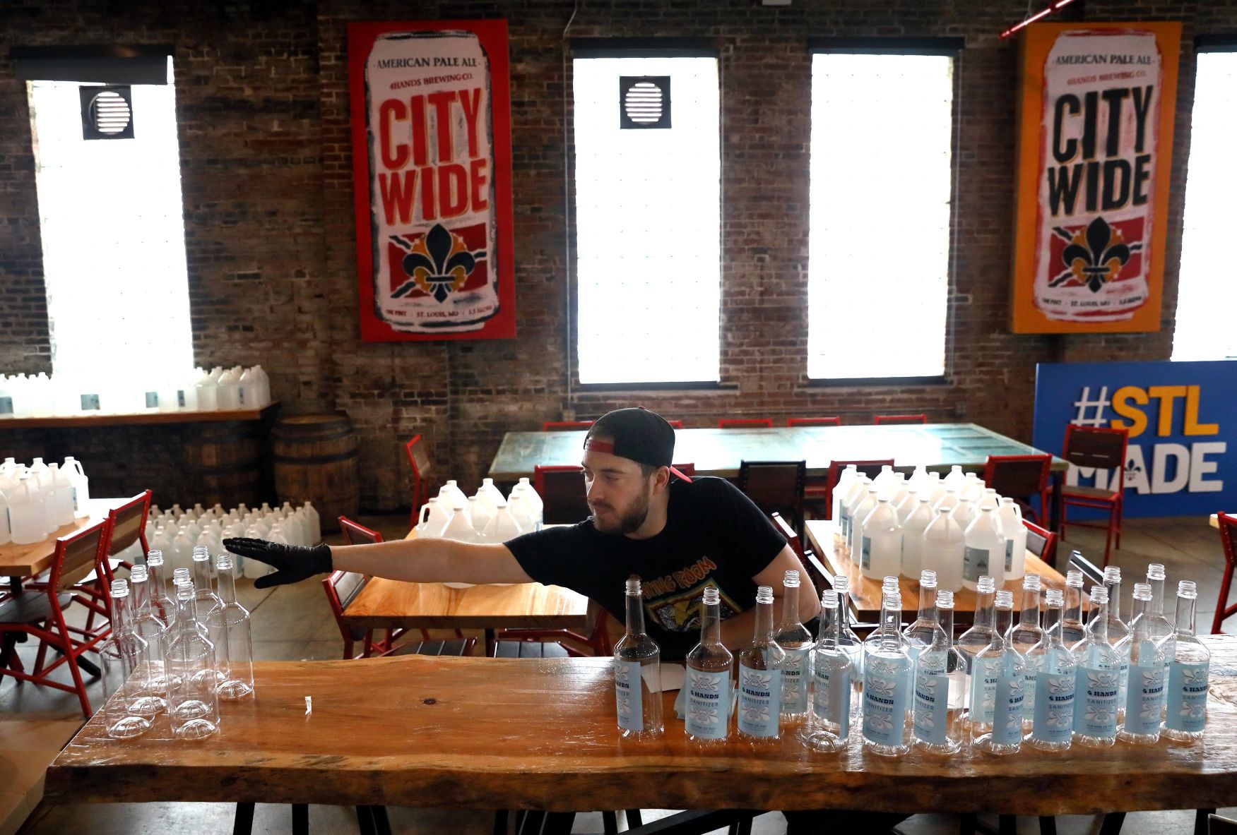 4 Hands Brewing packages hand sanitizer